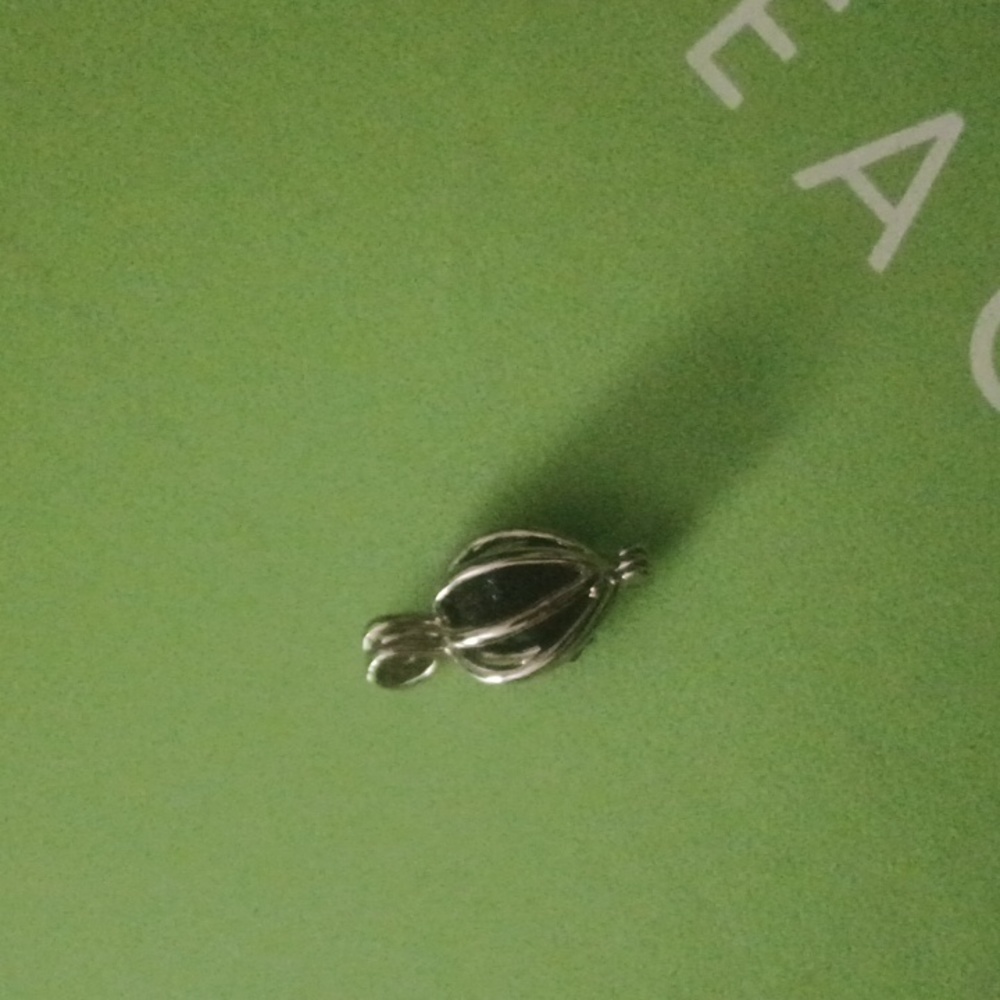 Genuine titanic coal sterling silver pendant